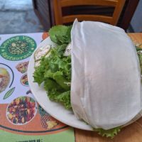 Herbs and rice paper that cones with the omelette at Loving Vegan in Da Nang