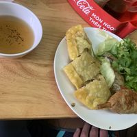Lemongrass thigh, pillow cake, and spring roll (already ate some of the spring roll though) at Pho Chay in Hanoi