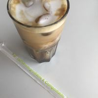 Vegan iced Spanish latte with coconut milk and biodegradable straw. 👏 at Leen's in Dubai