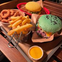 She Hulk Burger, Bacon BBQ Burger, onion rings and fries at EnVie Vegan in Geneva