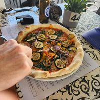 Vegeterian pizza with vegan cheese at La Bella Vita in Porto Covo