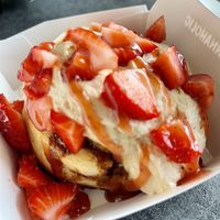 Peanut butter frosting with strawberry jam and strawberries. The pb frosting was SO good and for sure the best part! at Cinnaholic in Gilbert