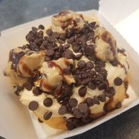 Cookie Monster Roll with Birthday Cake frosting at Cinnaholic in Gilbert