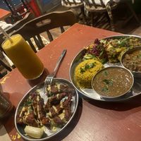 Mango Lassi, with delicious Thali for one serving and tasty Tandoori Wings   at En Root in South West London