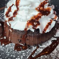 Vegan cheesecake with coconut whip cream at Warehouse Bar and Grill in Boston