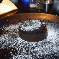 Appropriately, the cheesecake is like a mushy chocolate hockey puck. at Warehouse Bar and Grill in Boston