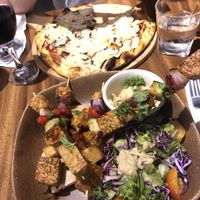Tempeh bowl and pizza with garlic and mushrooms  at Bong Bonlai at YK Art House in Phnom Penh