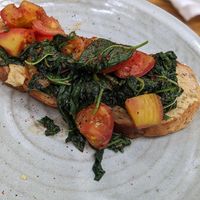 Toast Spinach & Roasted Tomatoes with Hummus 🍞 4.5$ at Bong Bonlai at YK Art House in Phnom Penh