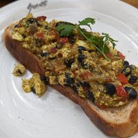 Toast with scrambled Tofu and redried 🫘 5$ at Bong Bonlai at YK Art House in Phnom Penh