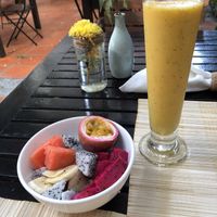 Fruit salad with coconut yogurt and passion mango smoothie  at Bong Bonlai at YK Art House in Phnom Penh