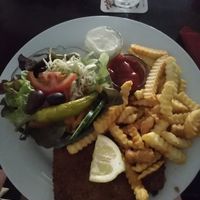 Vegan Schnitzel with fries, salad, ketchup and vegan mayo at Kult in Wurzburg