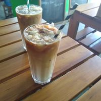 Lattes made with ice from a frozen bottle of distilled water, so tourists can safely suggest the ice. at Organic Smoothie Bowl & Cafe - Lazimpat in Kathmandu