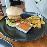 Mushroom and grain burger patty with crunchy fries at Bella by Sage in Ubud