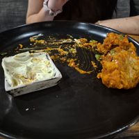 Half eaten buffalo wings - they were unreal at Bella by Sage in Ubud