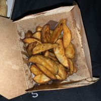 Spicy potato wedges  at Cardiff Pizza Company in Cardiff