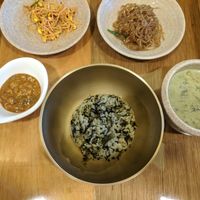 Rice dish with soup and 2 vegan side dishes: soybean sprouts and glass noodles. at Soonnam Siraegi 순남시래기 - Jung-gu in Seoul