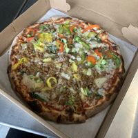 Thin crust but you’re able to ask for thicker at Create A Pizza in Rochester