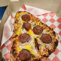 Personnel with grassfed pepperoni at Create A Pizza in Rochester