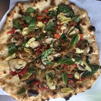 Garlic/oil with lots of veggies as well as beyond meat sausage.  at Create A Pizza in Rochester