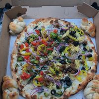 Cheap vegan garlic knots! Sweet! at Create A Pizza in Rochester