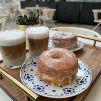 Clásico y Lemonpoppy seed con dos lattes  at Scoop 'n Dough in Lisbon