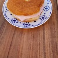Doughnut made into an ice-cream sandwich! at Scoop 'n Dough in Lisbon
