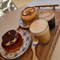 Tiramisu donut, special occasional donut, coffe and a latte at Scoop 'n Dough in Lisbon