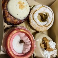 Blueberry panacotta (which is the first one of theirs I haven’t liked), pistachio creme, raspberry lychee, and banoffee 😍  at Scoop 'n Dough in Lisbon