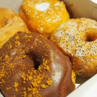 Cinnamon, salted caramel, Belgium chocolate and lemon poppy seed donuts! Yummmm at Scoop 'n Dough in Lisbon