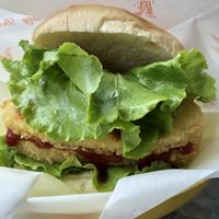 Close up of hash-browns in tomato sauce burger at G. Burger in Tainan
