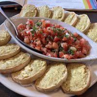 Vegan Bruschetta. Great with the house-made vegan Rinotta cheese. Comes with a double portion of fresh tomato/garlic/basil topping, with enough leftover to bring home and use for whatever. at Pizza Luce in Eden Prairie