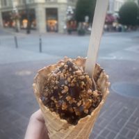Mini cone vegan vanilla soft serve and chocolate dip with some nuts  at Chocolat Favoris in Victoria