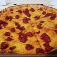 Tandoori chicken pizza at Pizzaholic in Newcastle Upon Tyne