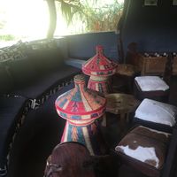 Traditional seating area under straw hut.  at Seble in Lilongwe