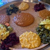 Beyaynetu for two. Not pictured: extra plate of injera at Habiba's Ethiopian Kitchen - Salt City Market in Syracuse