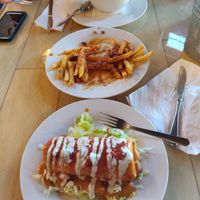 Chorizo chimichanga, chili cheese fries, and pot pie at 10th Street Diner in Indianapolis
