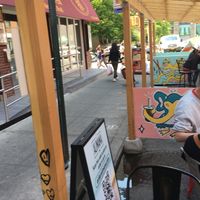 Outdoor seating (no tables, just seats) at Alimama Tea in New York City