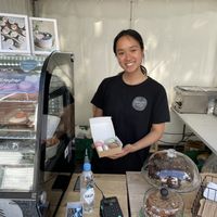 This lovely person offers happiness in a package: vegan macarons!  at Bønnespiren in Stavanger