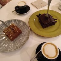 A couple of vegan cakes and two macchiatos with oat milk at Urbano Specialty Coffee in Madrid