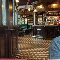 Cosy, railway waiting room themed interior at The Carriage in Newcastle Upon Tyne