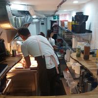 Busy kitchen at Flyover Fritterie & Chai Bar in Redfern