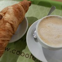 Croissant and coffee at Cooofe Bar in Barcelona