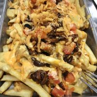 Fried and Gone to Heaven. Favor is multilevel. Comfort food taken to new heights. Two incredible sauces... and holy smokes! The best cheese fries anywhere, vegan or not. at HeyO Eats in Mountain View