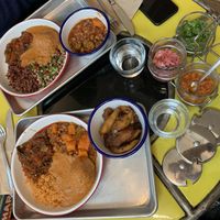 Delicious fufu with peanut sauce, rice, stew and plantains. at Teranga in New York City