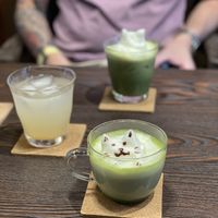 Hot matcha (iced in back)   at Neu Cat Cafe in Osaka