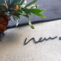 Logo at Neu Cat Cafe in Osaka