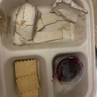 3 cheeses platter after some was eaten   at Rebel Cheese in New York City