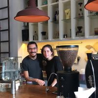 Time for a smile between coffee making! at Cuervo in Buenos Aires