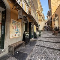 At the beginning of the prettiest stairs  at Smooth Operators in Bellagio