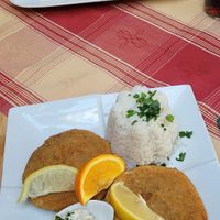 Vegane cevapcici mit letschogemüse und pommes. + Gemüselaibchen mit reis und sauce Tartar at Cafe Fischer in Jois